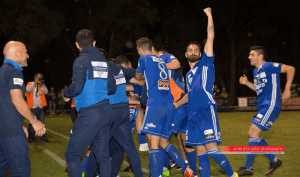 Celebrating a Half-time lead - Oakleigh Cannons - Smile for Peter Photography